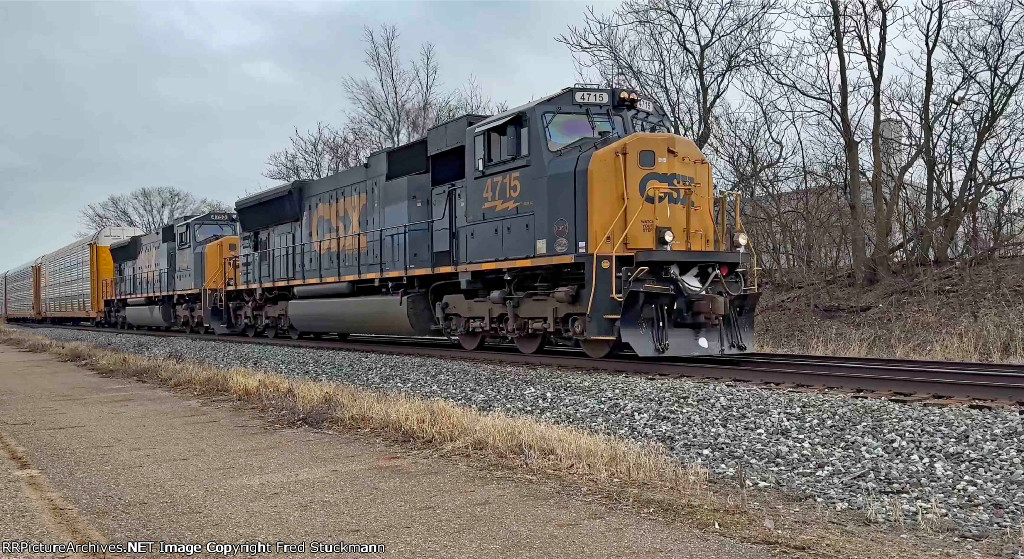 CSX 4715 leads M277.